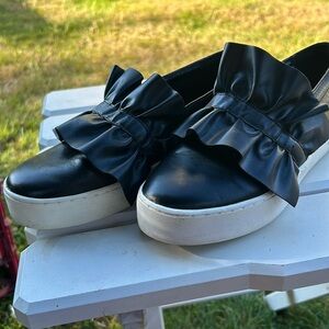 Michael Kors slip on black leather shoes. Size 7M.